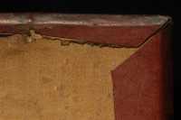 Corner covering of the codex; trace of the trimming of superfluous leather on the board